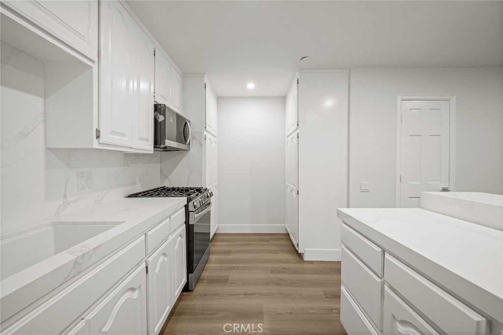 Updated Kitchen with all new appliances - 17200 Newhope 31, Fountain Valley CA 92708 - photo 7