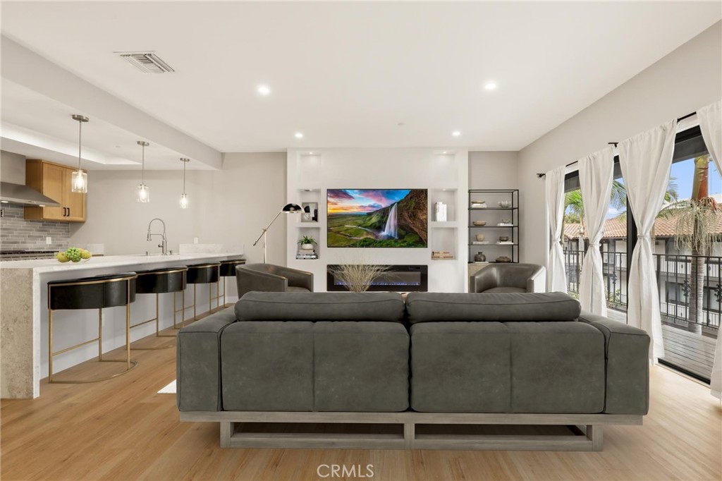 Home is virtually staged. - 17200 Newhope Street 334, Fountain Valley CA 92708 - photo 1
