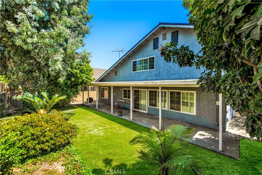 Large backyard will enhance your entertaining. Huge covered patio allows relaxing outside all seasons. - 17455 Winemast Street, Fountain Valley CA 92708 - photo 3