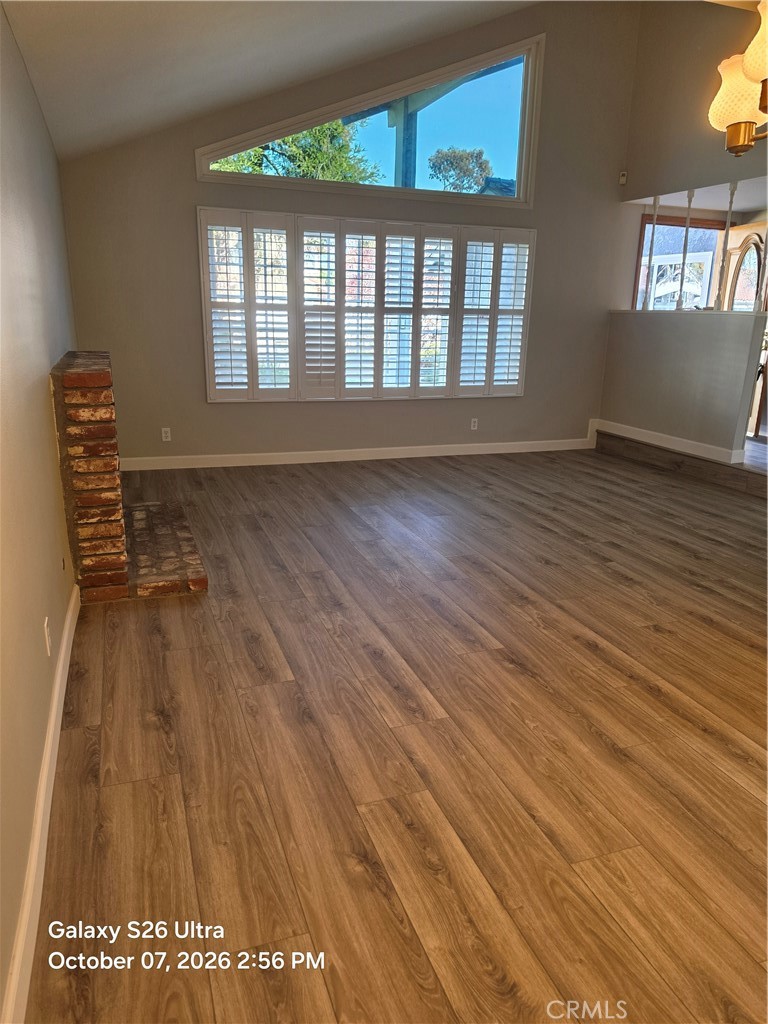 New laminate flooring throughout most of 1st level - 17455 Winemast Street, Fountain Valley CA 92708 - photo 9