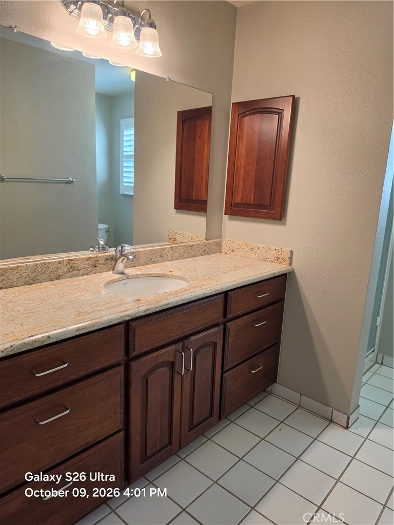 Remodeled downstairs bath with shower - 17455 Winemast Street, Fountain Valley CA 92708 - photo 14
