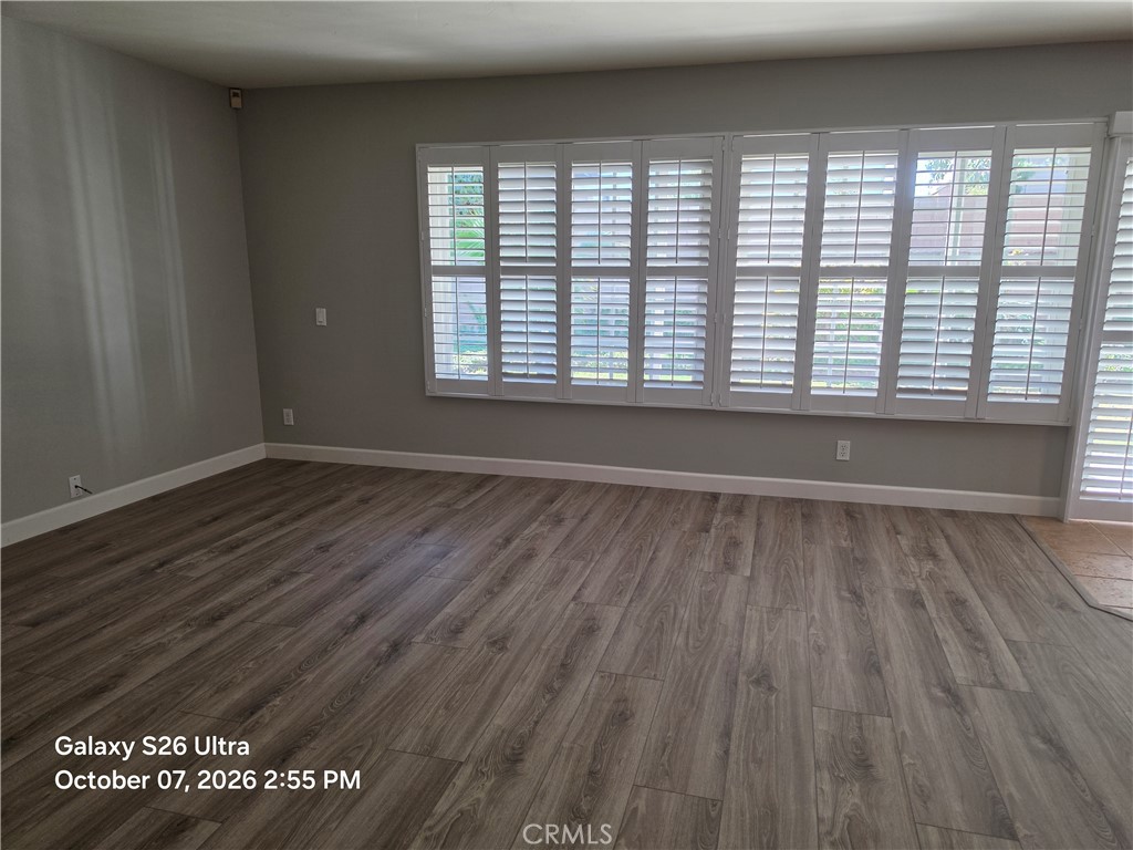 Another view of the large family room. Brand new wood vinyl laminate - 17455 Winemast Street, Fountain Valley CA 92708 - photo 16
