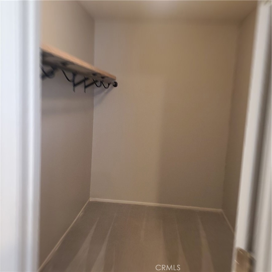 1 of 2 walk-in closets in the primary bedroom - 17455 Winemast Street, Fountain Valley CA 92708 - photo 23