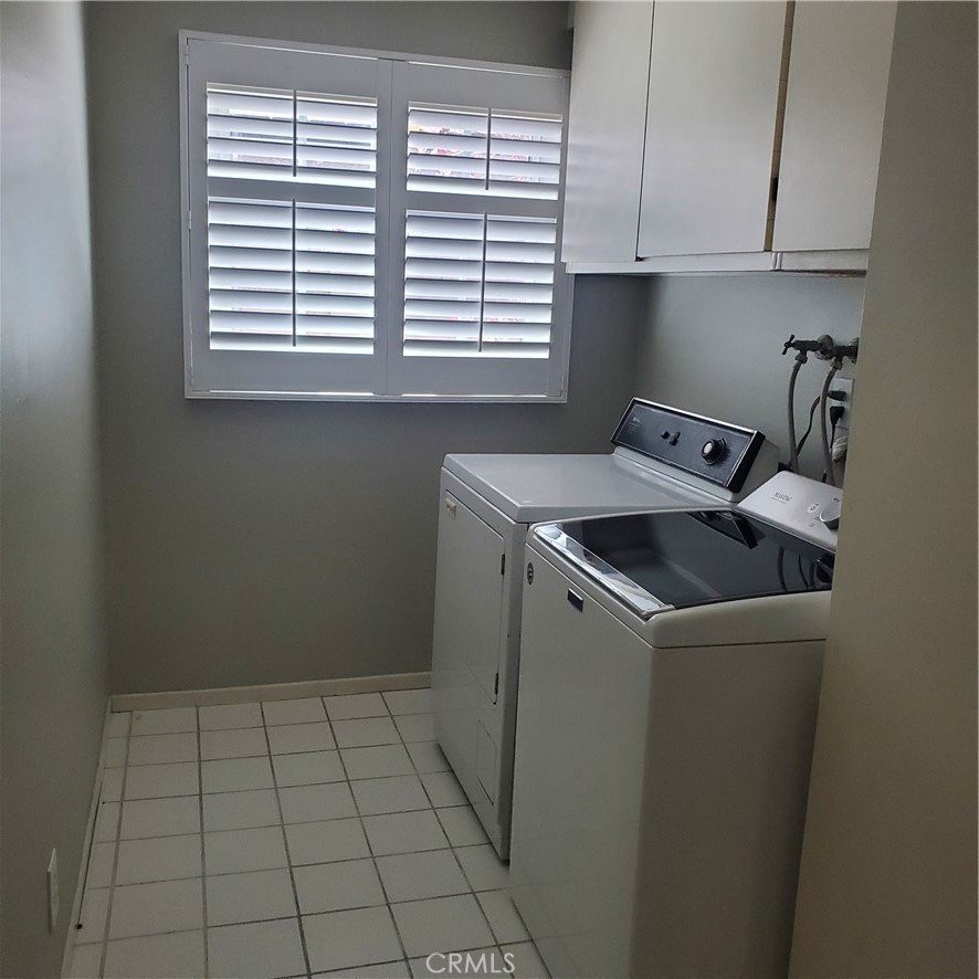 Washer and dryer included. Inside laundry room - 17455 Winemast Street, Fountain Valley CA 92708 - photo 27