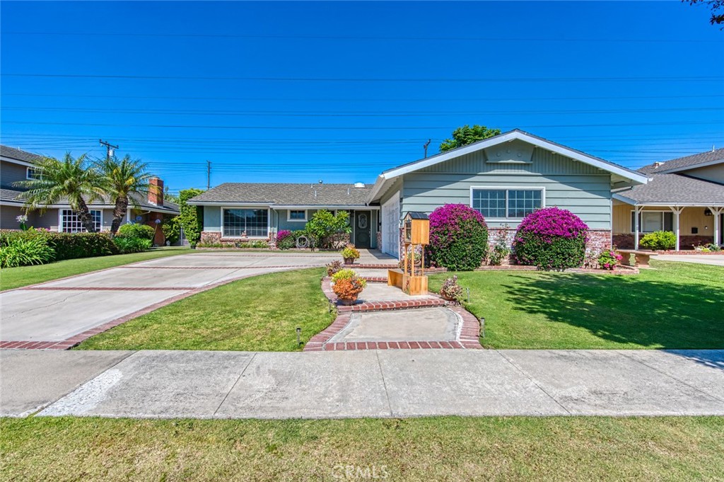 Welcome to this 4-bed, 3-bath home on a quiet cul-de-sac street. - 17597 Santa Paula, Fountain Valley CA 92708 - photo 1