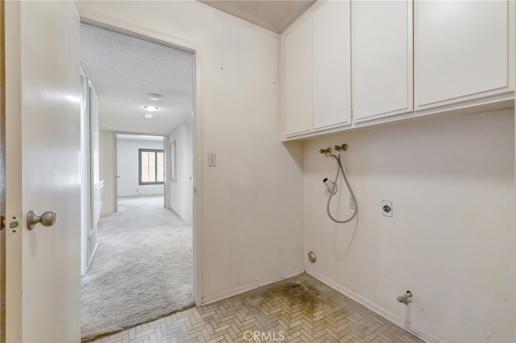 laundry area off Garage - 17793 San Rafael Street, Fountain Valley CA 92708 - photo 28