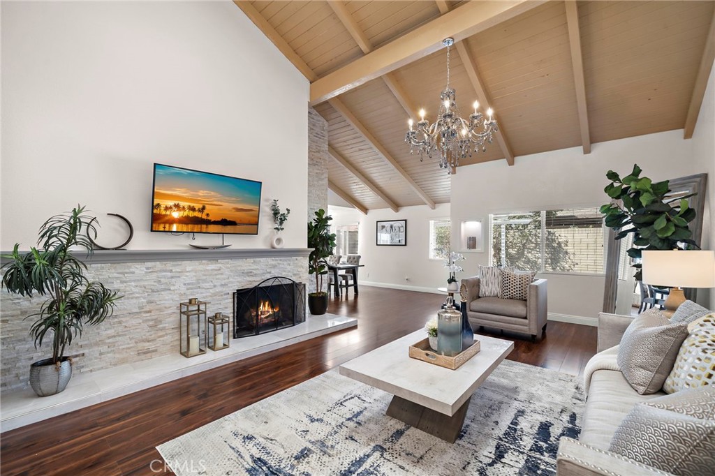 Paneled, beamed high ceilings throughout living room - 17925 Mount Coulter, Fountain Valley CA 92708 - photo 4