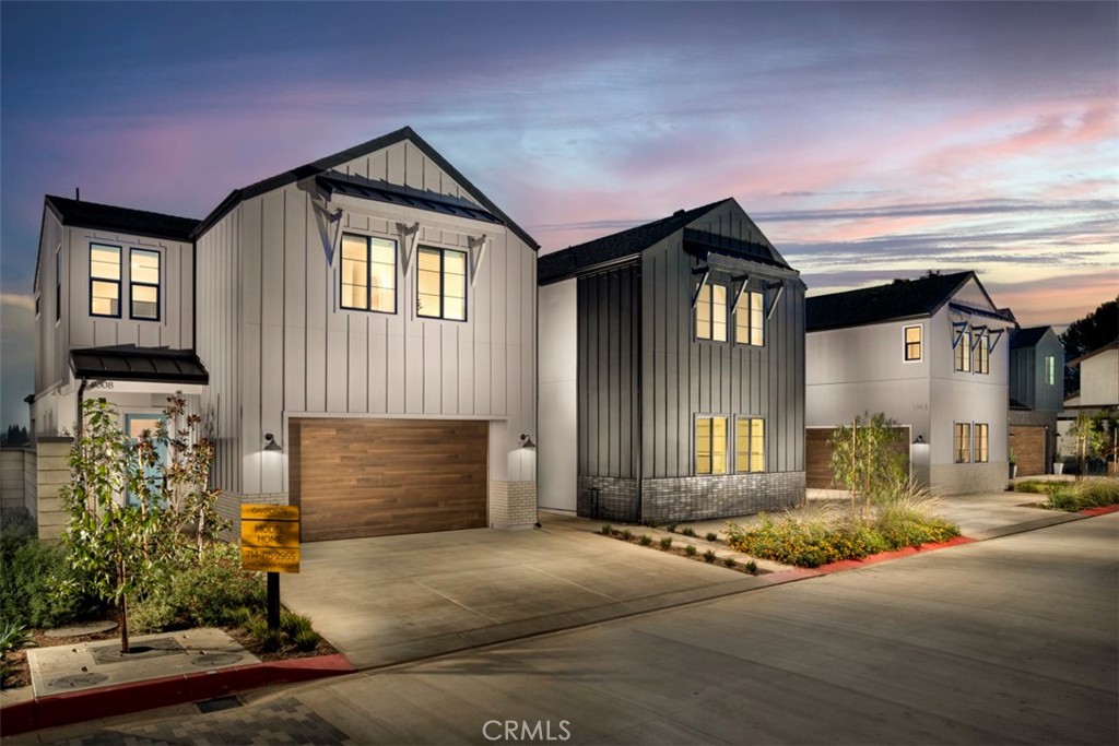 model home street scene - 18016 Roch Court, Fountain Valley CA 92708 - photo 1