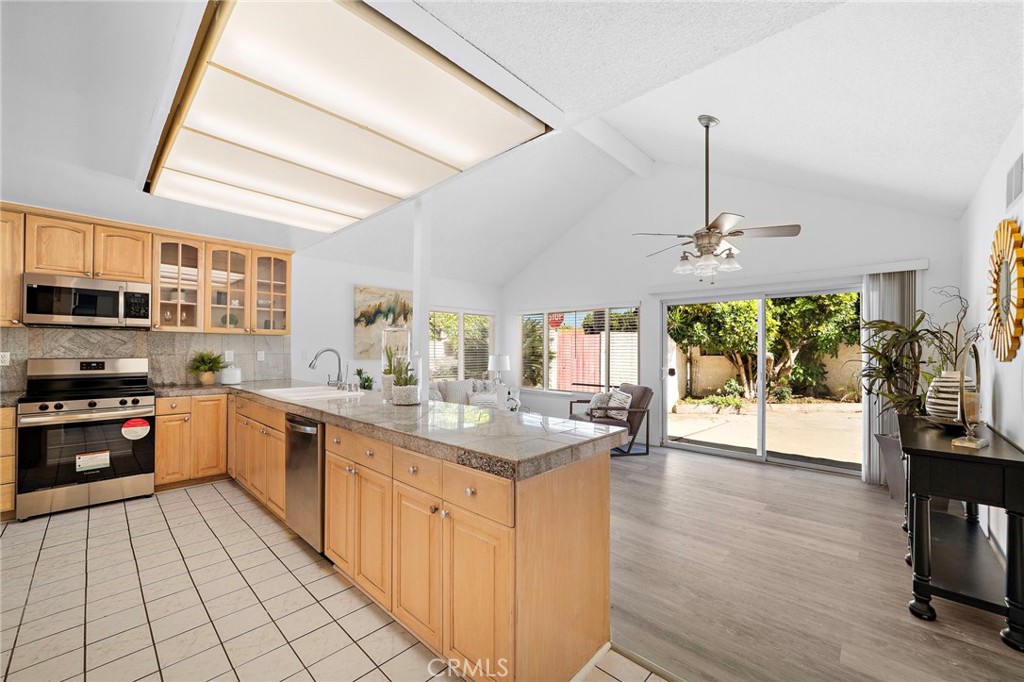 Kitchen view & family room - 18162 Santa Adela Circle, Fountain Valley CA 92708 - photo 16
