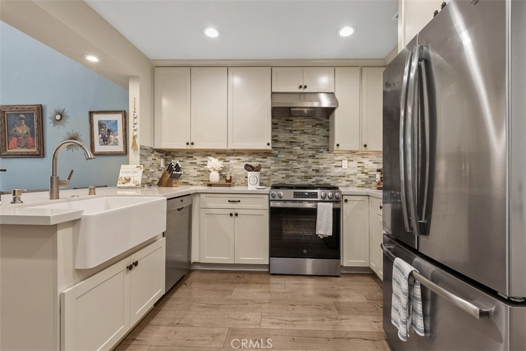 Stainless steel appliances - 18261 Sanmian Court, Fountain Valley CA 92708 - photo 13