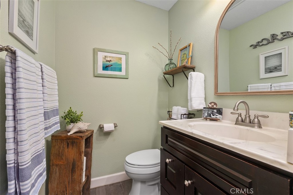 Full downstairs bathroom with Shower - 18261 Sanmian Court, Fountain Valley CA 92708 - photo 16