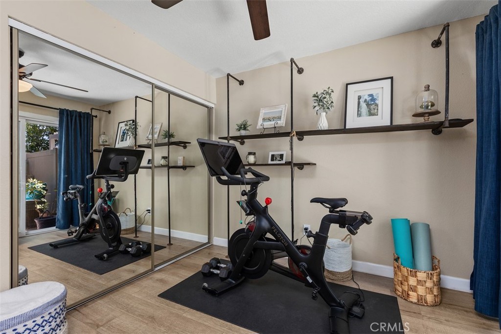 Downstairs bathroom opens to patio - 18261 Sanmian Court, Fountain Valley CA 92708 - photo 19