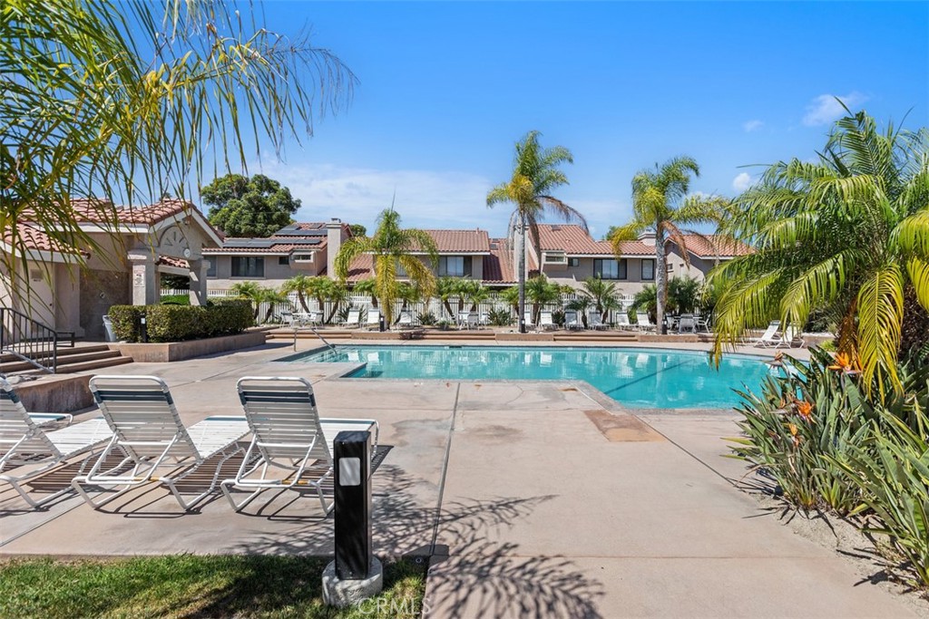 Community pool - 18261 Sanmian Court, Fountain Valley CA 92708 - photo 35