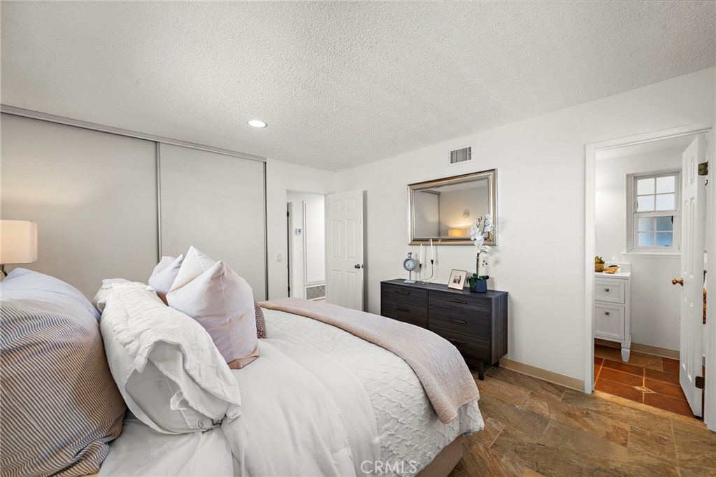Recessed lighting, plantation shutters and mirrored closets - 18474 Tamarind Street, Fountain Valley CA 92708 - photo 17