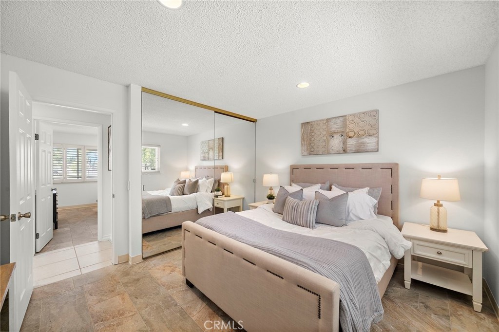 Secondary room 2 with large mirrored closet - 18474 Tamarind Street, Fountain Valley CA 92708 - photo 22