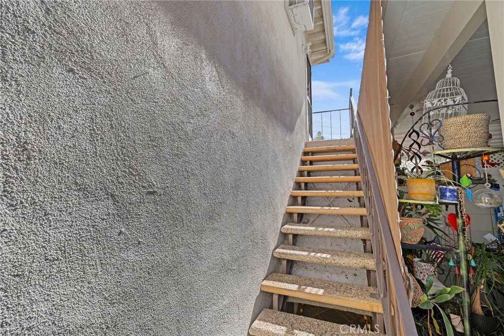 Stairs up to studio - 18569 San Marcos, Fountain Valley CA 92708 - photo 2