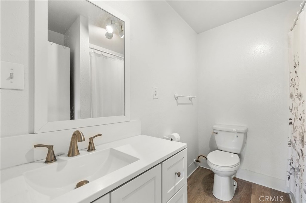 Remodelled bathroom with tub/shower - 18569 San Marcos, Fountain Valley CA 92708 - photo 9