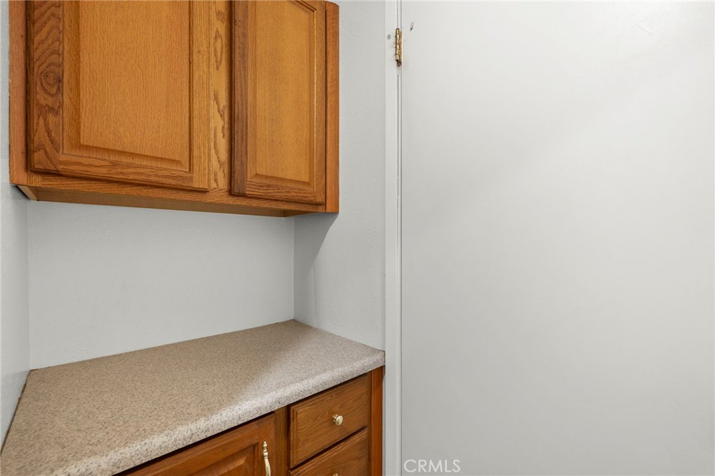 Extra storage in bathroom - 18569 San Marcos, Fountain Valley CA 92708 - photo 10