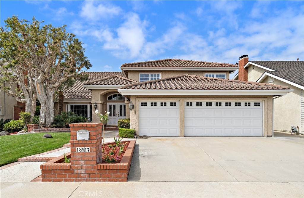 Beautiful Curb Appeal w/a nice wide Driveway - 18817 Tomahawk Street, Fountain Valley CA 92708 - photo 1