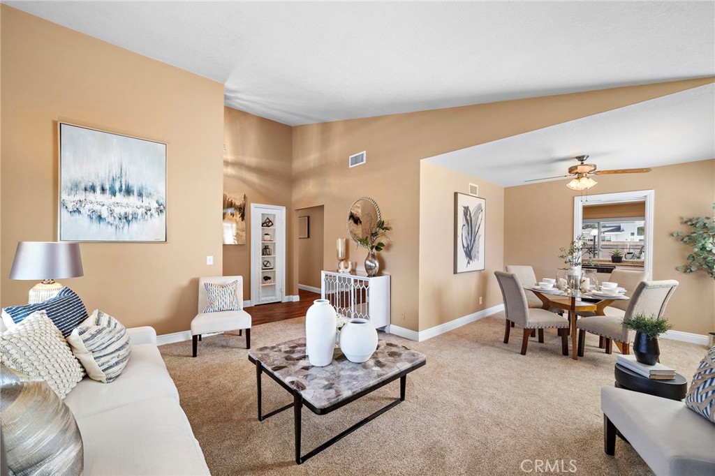 with an adjoining dining room - 18898 Persimmon Circle, Fountain Valley CA 92708 - photo 6