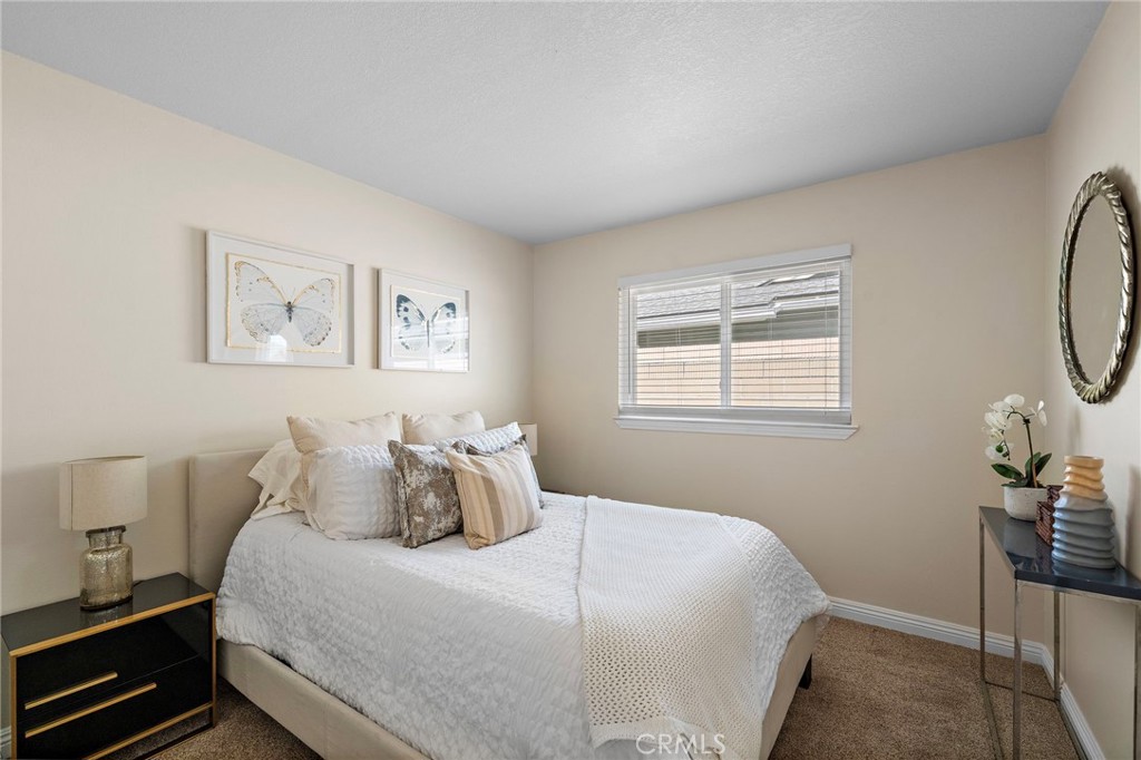 1 of 4 bedrooms windows have blinds - 18898 Persimmon Circle, Fountain Valley CA 92708 - photo 15