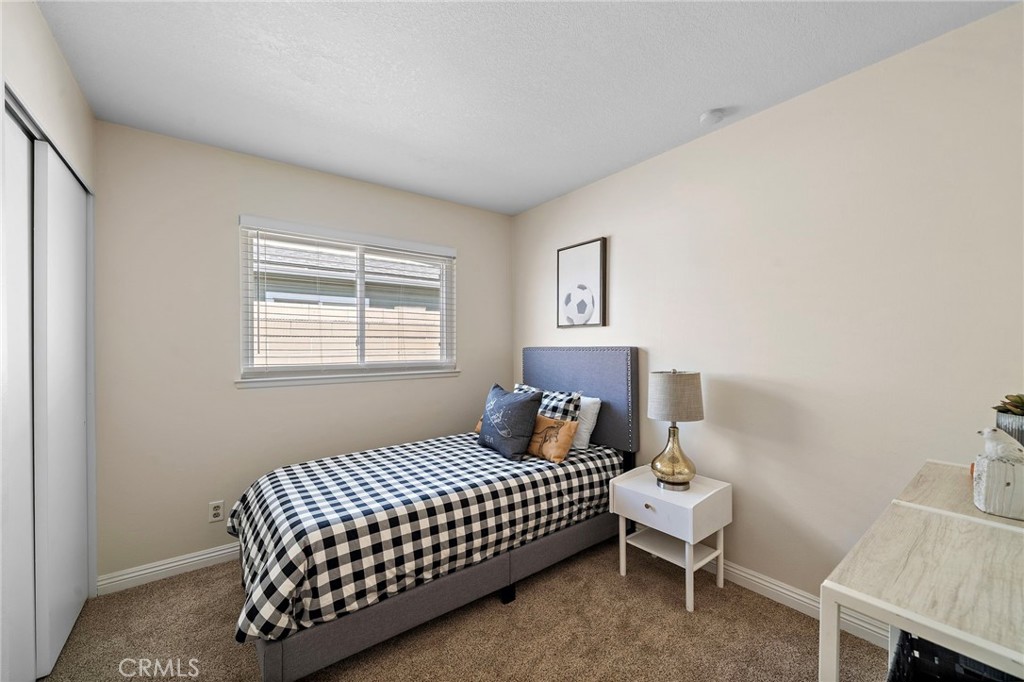 1 of 4 bedrooms windows have blinds - 18898 Persimmon Circle, Fountain Valley CA 92708 - photo 17