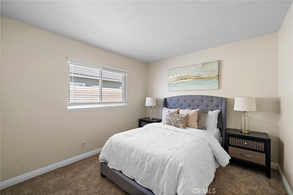 1 of 4 bedrooms windows have blinds - 18898 Persimmon Circle, Fountain Valley CA 92708 - photo 19