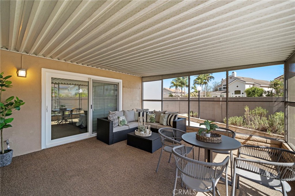 direcdt access from the primary suite to the patio - 18898 Persimmon Circle, Fountain Valley CA 92708 - photo 28