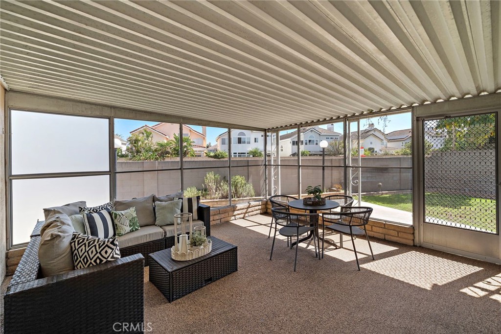 enclosed patio with plenty of natural light - 18898 Persimmon Circle, Fountain Valley CA 92708 - photo 29