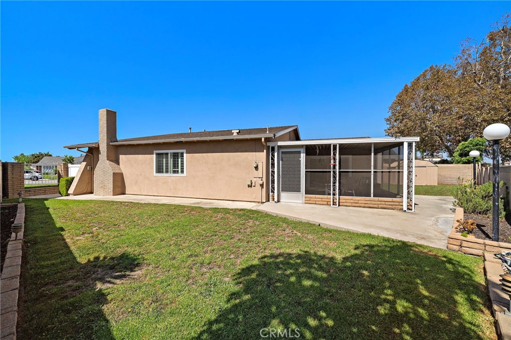 large grass area - 18898 Persimmon Circle, Fountain Valley CA 92708 - photo 31
