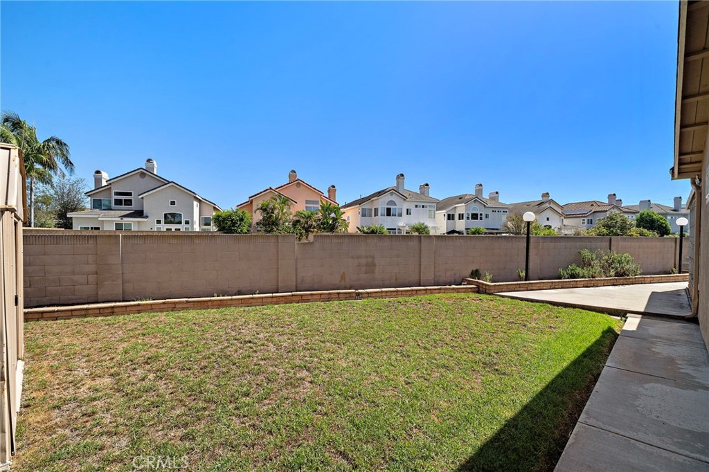 2nd large grass area - 18898 Persimmon Circle, Fountain Valley CA 92708 - photo 34