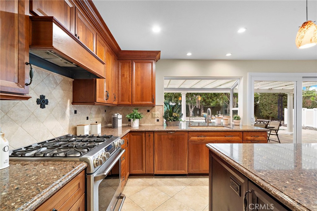 Expansive gourmet kitchen with garden window - 8566 Phoenix Avenue, Fountain Valley CA 92708 - photo 10