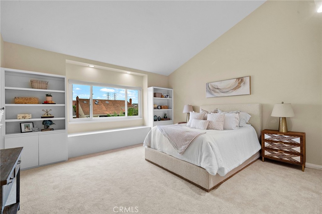 Spacious bedroom 2 with window seat and built-ins - 8566 Phoenix Avenue, Fountain Valley CA 92708 - photo 33