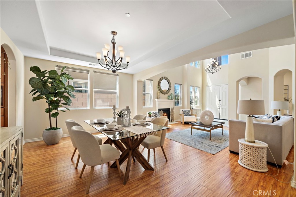 Formal dinning area and living room on the right - 9042 Lemongrass Court, Fountain Valley CA 92708 - photo 11