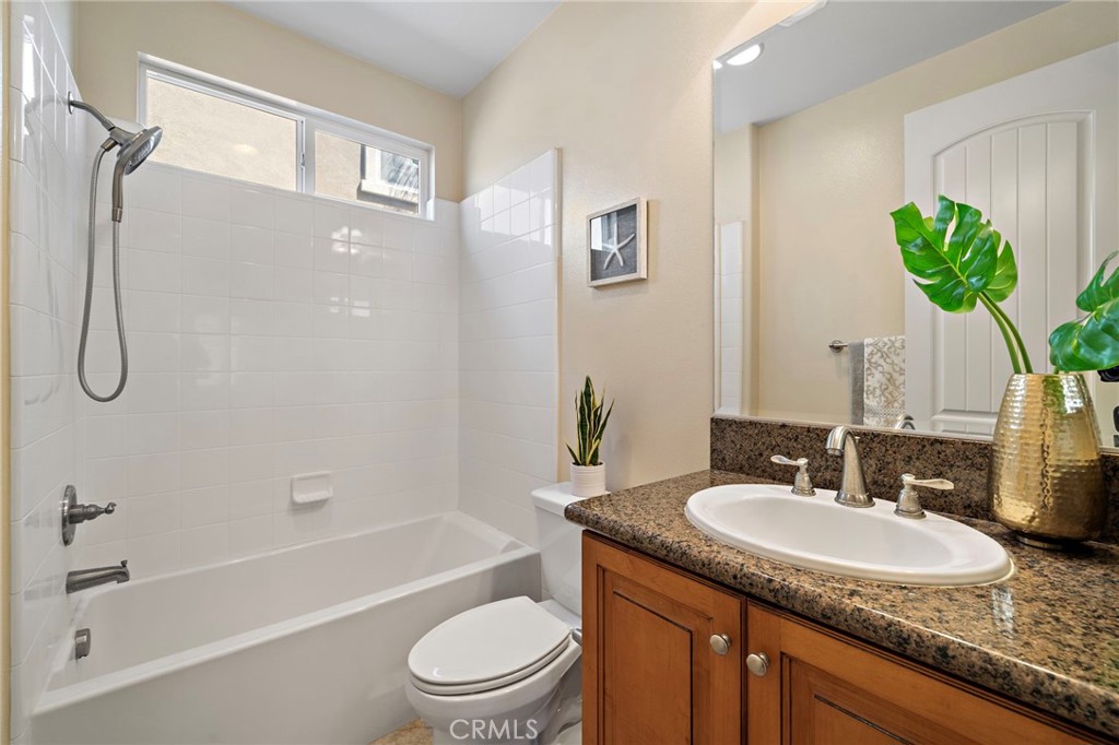 First floor bathroom #1 - 9042 Lemongrass Court, Fountain Valley CA 92708 - photo 13
