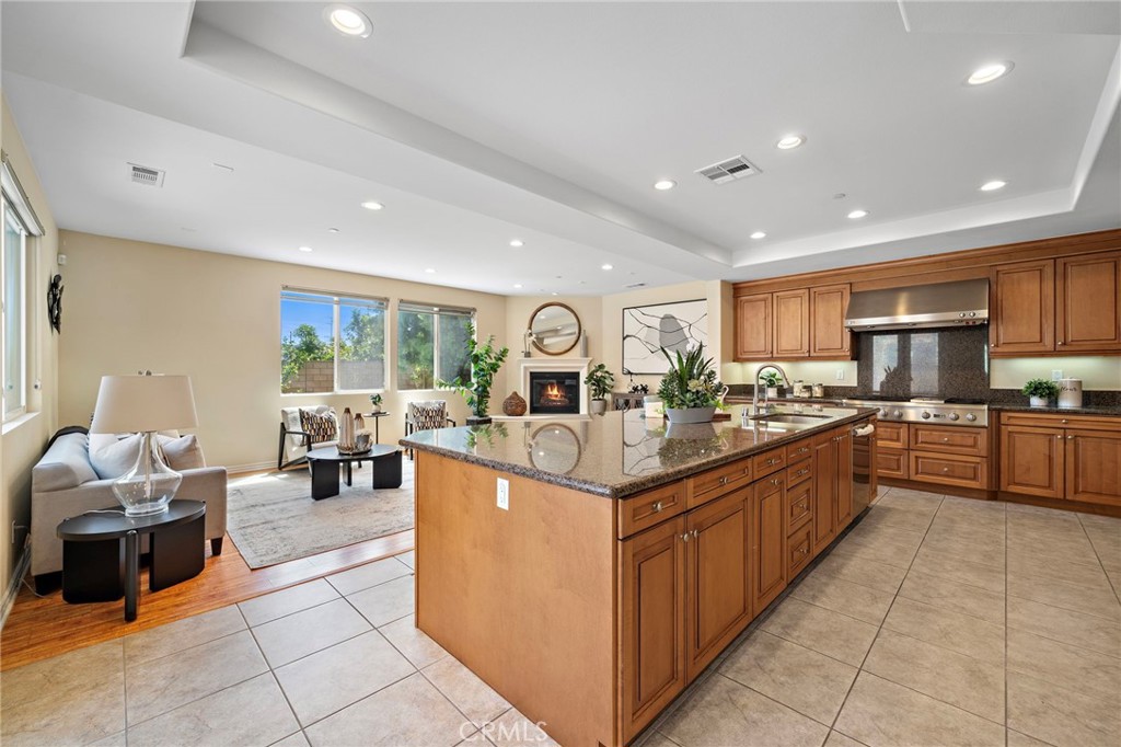 Kitchen and Family room - 9042 Lemongrass Court, Fountain Valley CA 92708 - photo 18