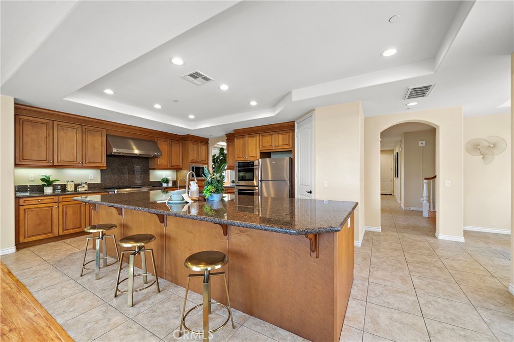 Kitchen view - 9042 Lemongrass Court, Fountain Valley CA 92708 - photo 19