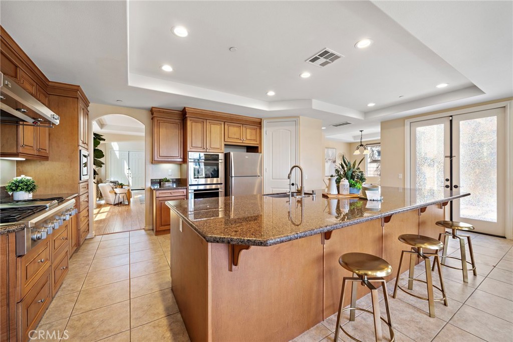 Kitchen view - 9042 Lemongrass Court, Fountain Valley CA 92708 - photo 21