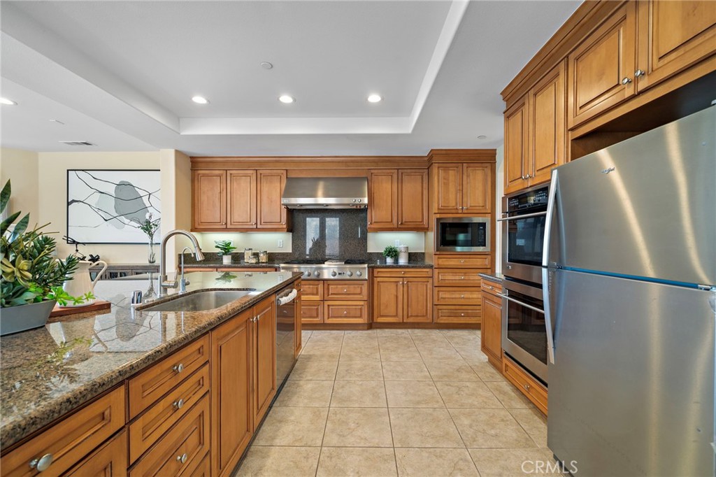 Kitchen view - 9042 Lemongrass Court, Fountain Valley CA 92708 - photo 23