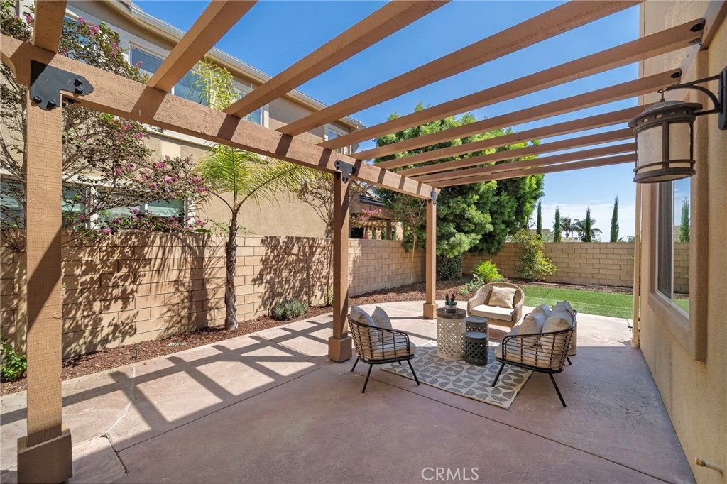 Back yard patio area - 9042 Lemongrass Court, Fountain Valley CA 92708 - photo 40