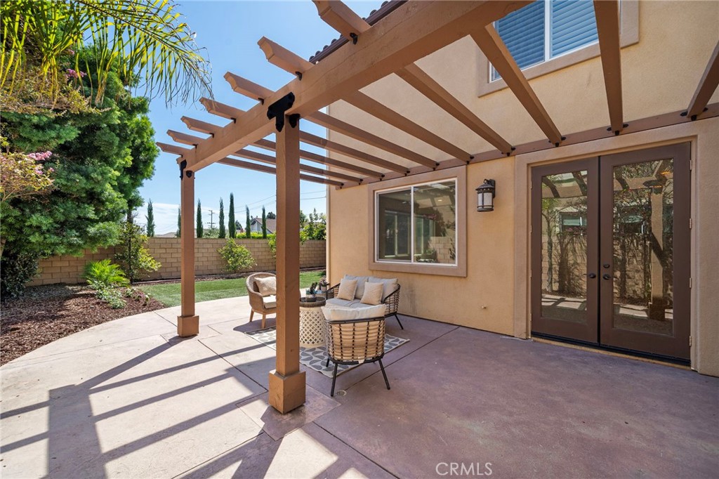Back yard patio area - 9042 Lemongrass Court, Fountain Valley CA 92708 - photo 41