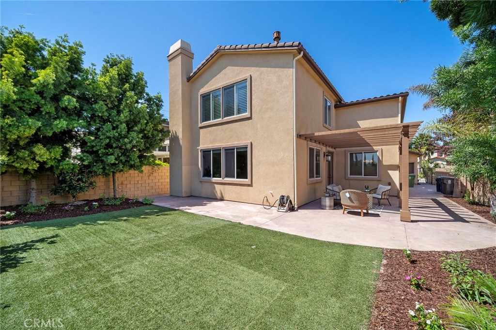 Back yard view angel 1 - 9042 Lemongrass Court, Fountain Valley CA 92708 - photo 43