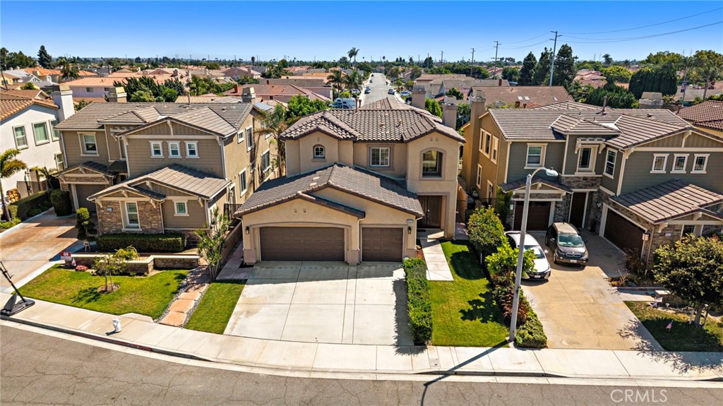 Sky view of the house FRONT facing north - 9042 Lemongrass Court, Fountain Valley CA 92708 - photo 47