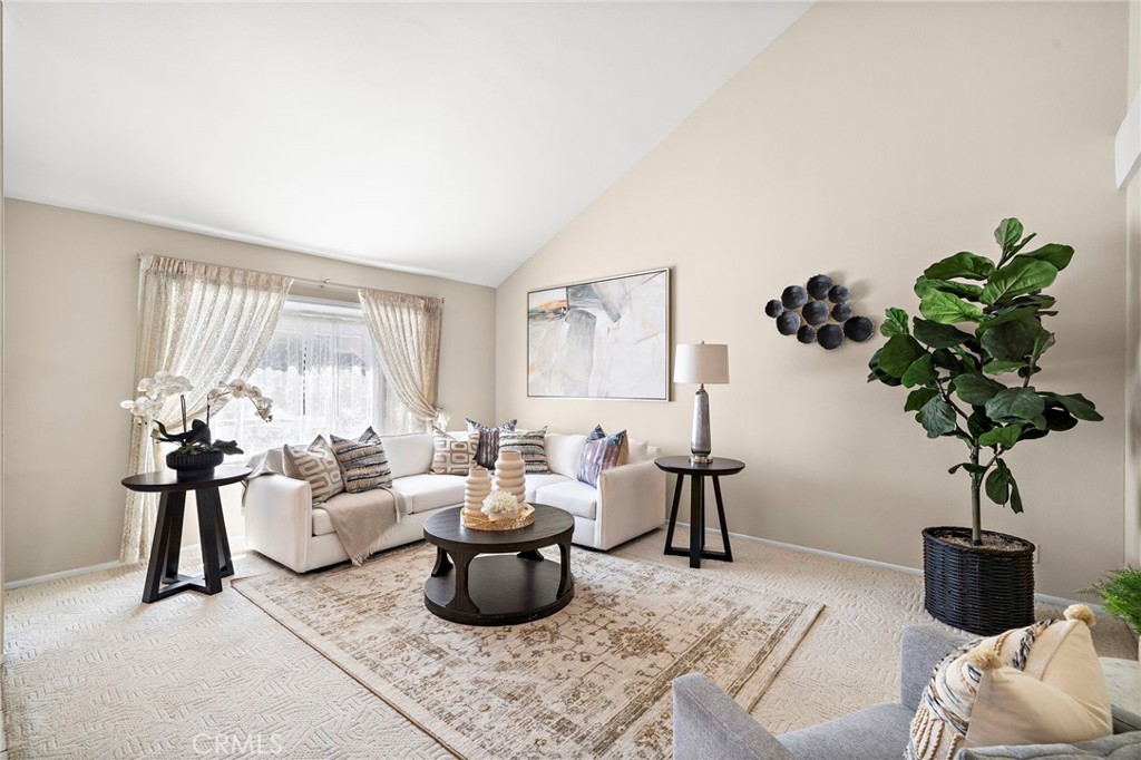 Spacious living room with an open, airy layout - 9115 McBride River Avenue, Fountain Valley CA 92708 - photo 5