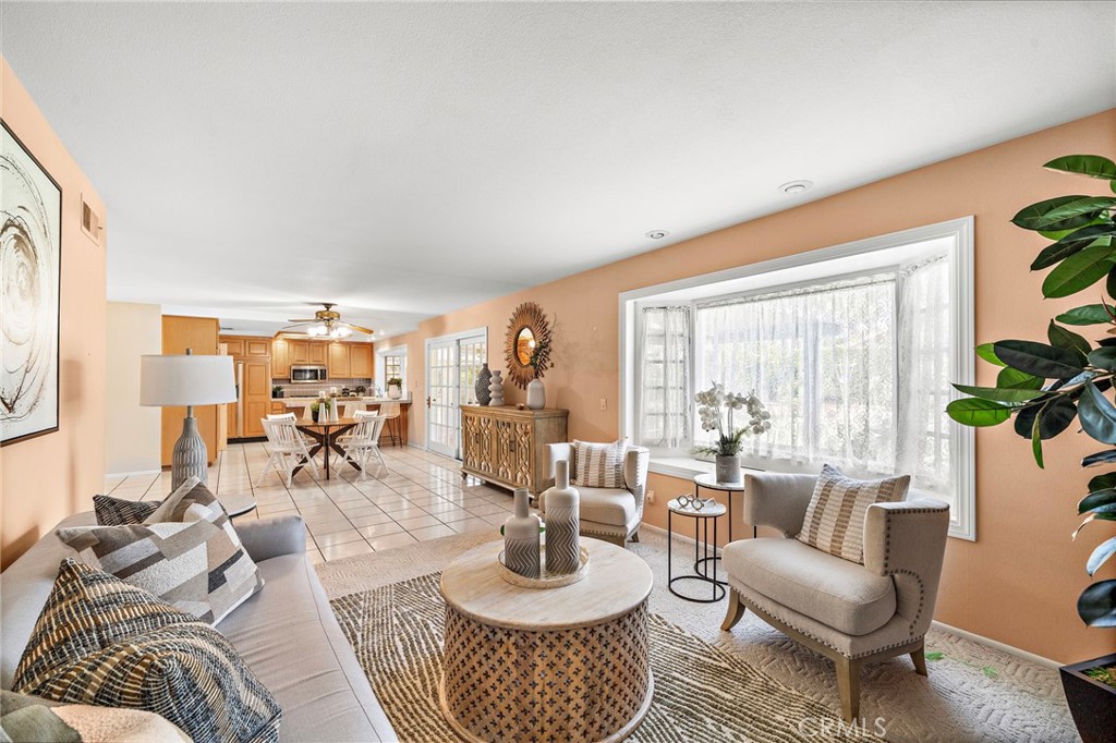 Family room with flexible seating space - 9115 McBride River Avenue, Fountain Valley CA 92708 - photo 17