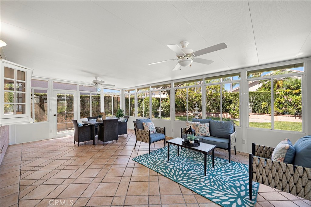 360 Square Foot Sun Room Addition with Windows all Around, Tile Flooring, and 2 Ceiling Fans - 9115 McBride River Avenue, Fountain Valley CA 92708 - photo 25