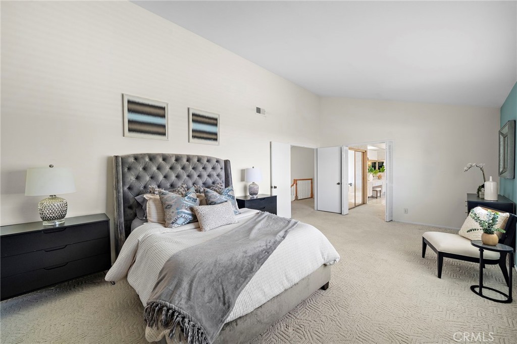 Primary suite has sitting room area, fireplace, 2 mirrored closets - one is a walk-in and a spa-inspired bathroom - 9115 McBride River Avenue, Fountain Valley CA 92708 - photo 30