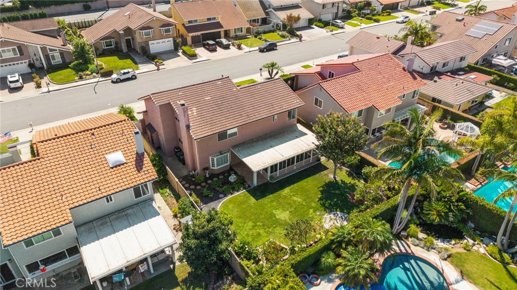 Aerial view of the rear yard and surrounding homes - 9115 McBride River Avenue, Fountain Valley CA 92708 - photo 64