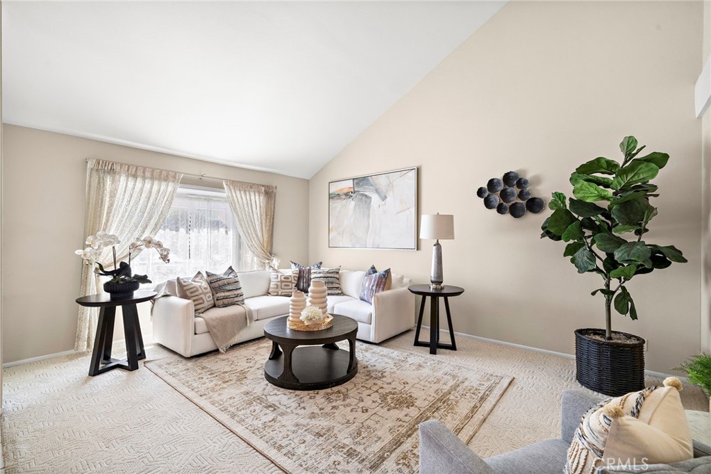 Elegant living space with abundant natural light and room to relax. - 9115 McBride River Avenue, Fountain Valley CA 92708 - photo 5