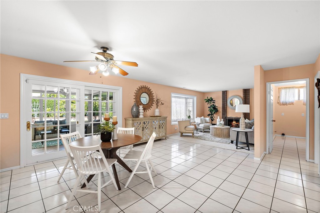 Bright breakfast area beside sliding doors to the backyard. - 9115 McBride River Avenue, Fountain Valley CA 92708 - photo 11